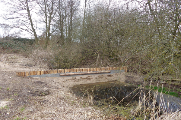 Pfahl einspulen am Waldrand